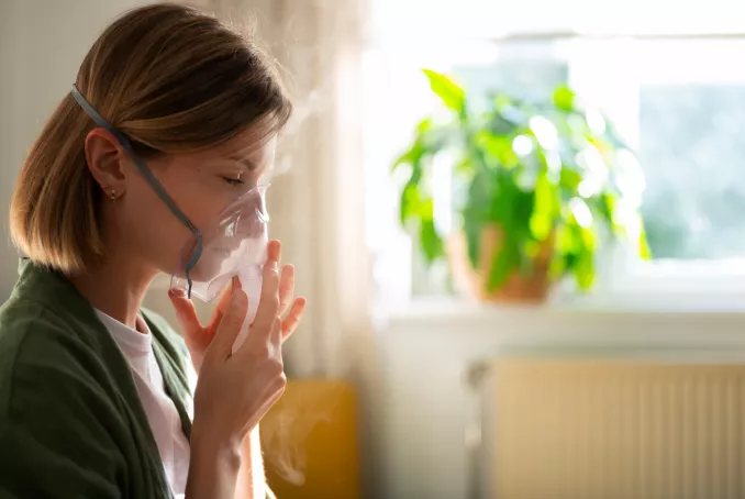 Patiente avec un masque pour respirer